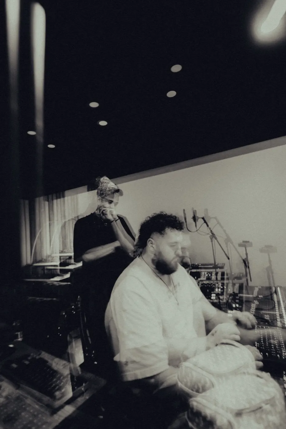Two collaborators working, in motion